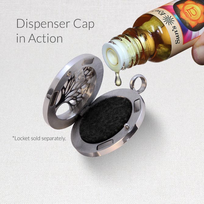Dispenser cap being used with a bottle of oil, on a light gray background.