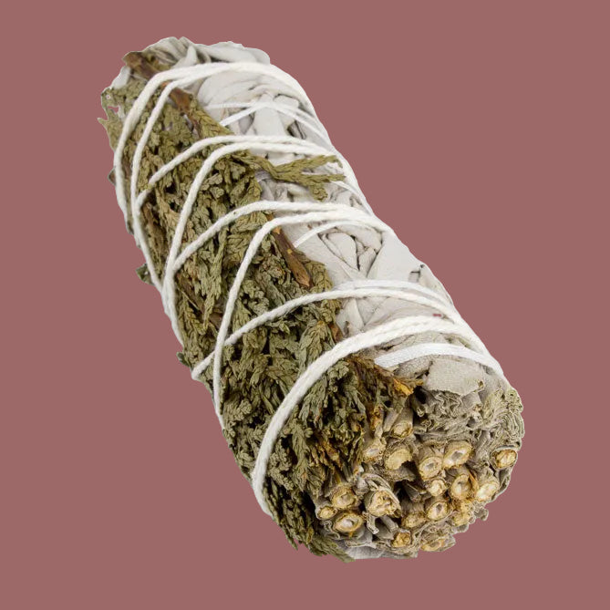Sage Smudge Stick bundle wrapped with white string on a light gray background Sun's Eye Scentsium