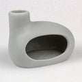 Gray ceramic Smudging-Hearth with a unique, abstract design on a white background
