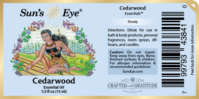 Sun's Eye Cedarwood essential oil label with artistic design and text.