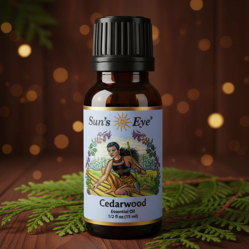 Sun's Eye Orange Essential Oil bottle on a light gray background