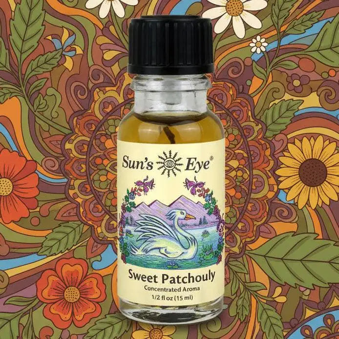 Bottle of Sun's Eye Sweet Patchouly with a colorful floral and nature-themed background Sun's Eye Scentsium Sun's Eye Scentsium