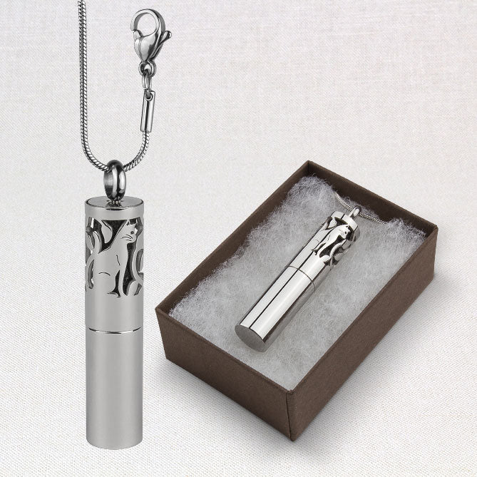 Silver cylindrical urn with cat design on a white background
