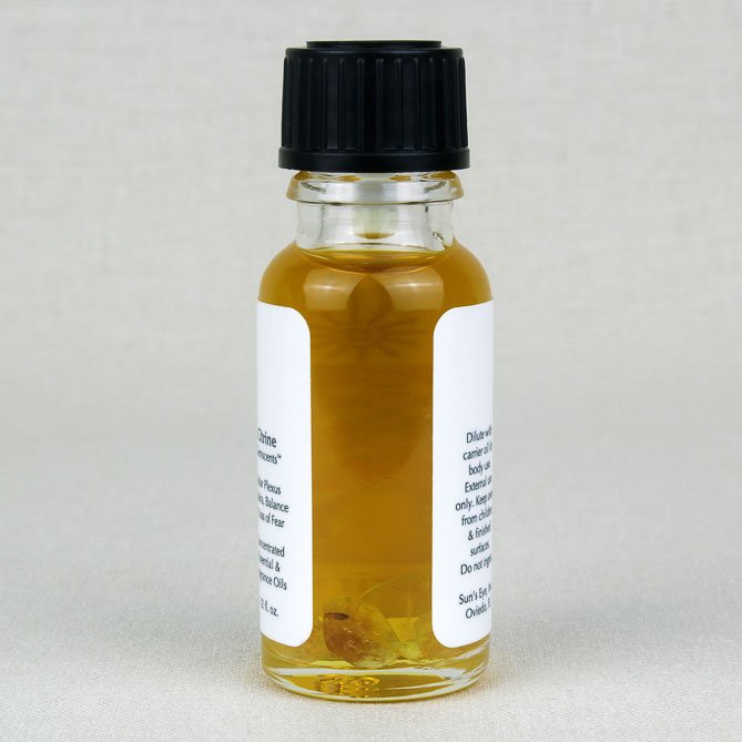Bottle or pure Cintrine Oil with black cap and white label on a light gray background