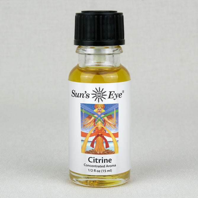 Bottle of Sun's Eye Citrine concentrated aroma on a light gray background