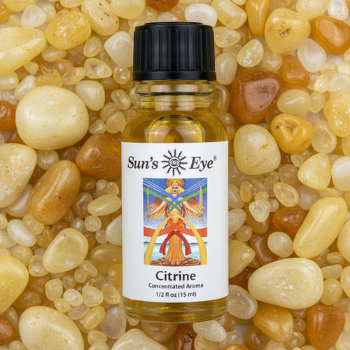 Bottle of Sun's Eye Citrine concentrated aroma on a citrine background