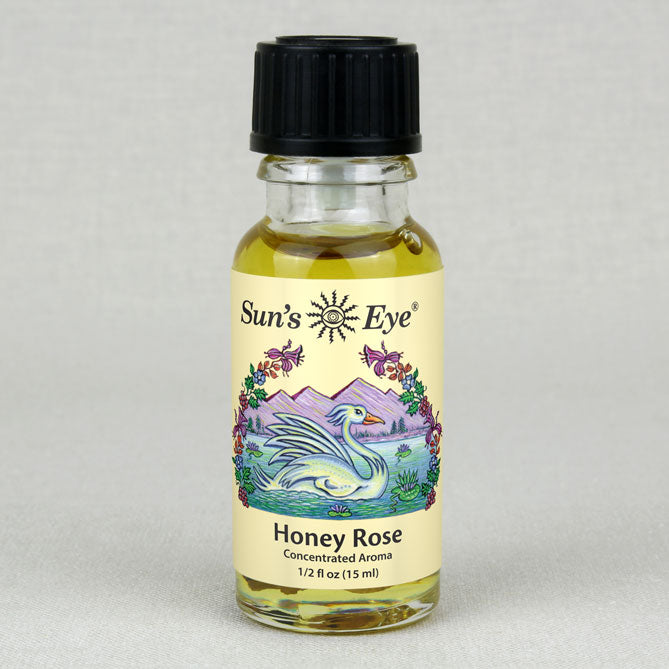 Bottle of Sun's Eye Honey Rose concentrated aroma on a gray background