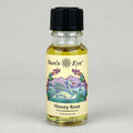 Bottle of Sun's Eye Honey Rose concentrated aroma on a gray background