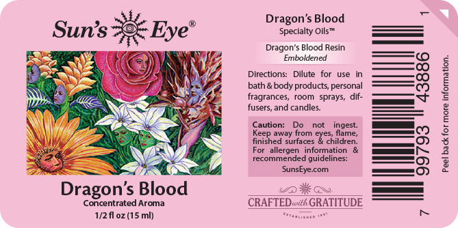 Sun's Eye Dragon's Blood Specialty Oils concentrated aroma label, featuring a pink background with product details, a floral graphic, a barcode, and branding text.