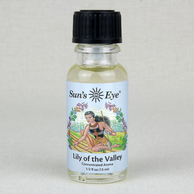 Bottle of Sun's Eye Lily of the Valley concentrated aroma on a light gray background