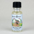Bottle of Sun's Eye Lily of the Valley concentrated aroma on a light gray background