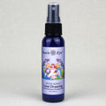 Blue spray bottle labeled 'Sun's Eye Mystic Blends Love Drawing' on a light gray background