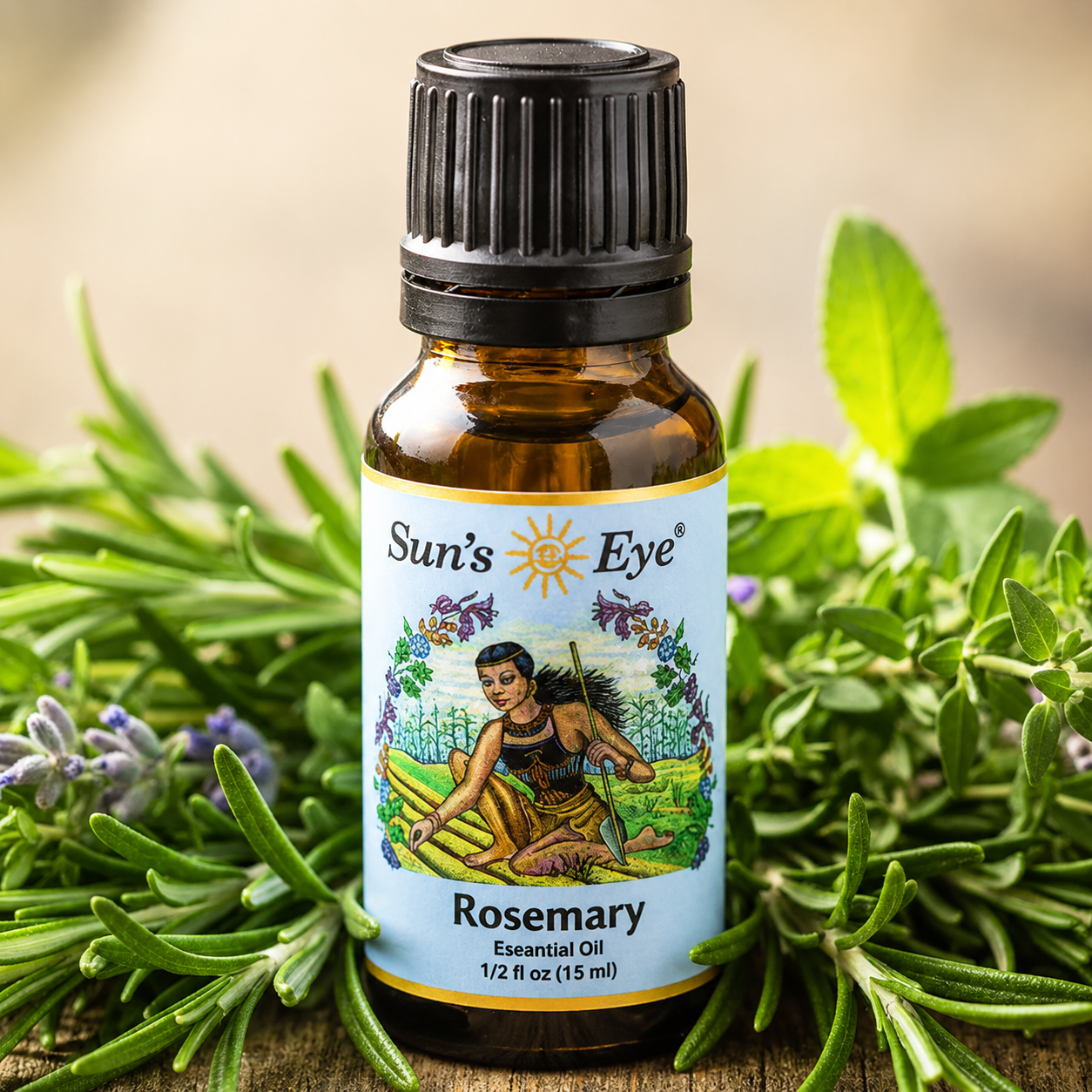 Bottle of Sun's Eye Rosemary Essential Oil surrounded by rosemary leaves on a wooden surface.