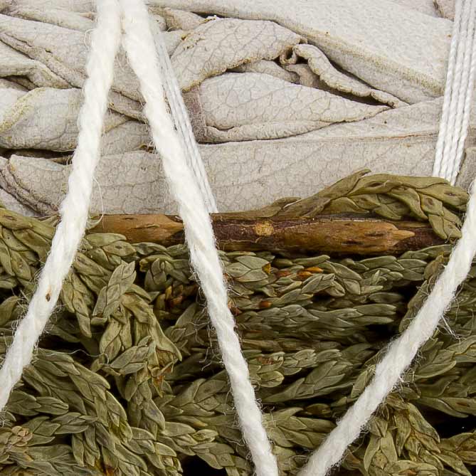 Close-up of dried lavender flowers with a wooden stick and white string