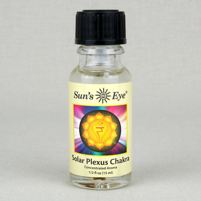 Bottle of Sun's Eye Solar Plexus Chakra concentrated aroma on a gray background