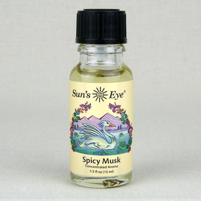 Bottle of Sun's Eye Spicy Musk fragrance oil with a black cap on a light gray background