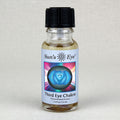 Bottle of Sun's Eye Third Eye Chakra concentrate aroma on a light gray background